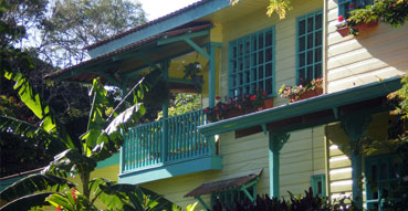 Under the balcony